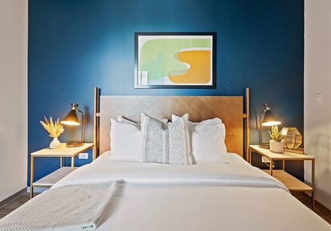 Sink into crisp linens for a restful, boutique-style night.