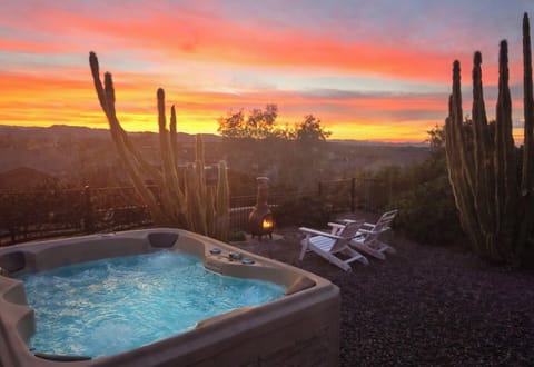 Amazing sunrises, private patio with hot tub and open sky mountain views. 
