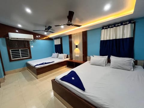 Deluxe Quadruple Room, Air conditioning | Free WiFi