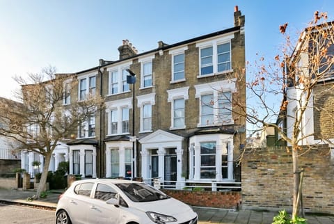 Classic Victorian terrace on a quiet, leafy residential street full of period charm.