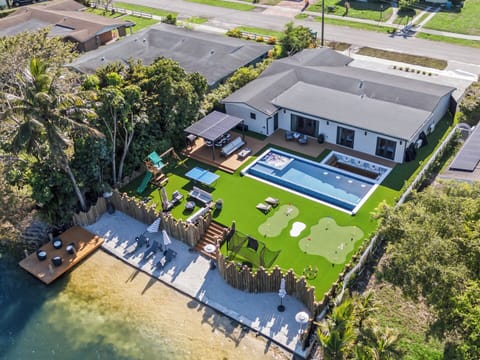 Panoramic aerial view of the property and its location