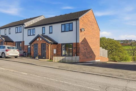 Exterior photos show the property, surroundings, and neighborhood, giving guests a clear sense of its location and setting.