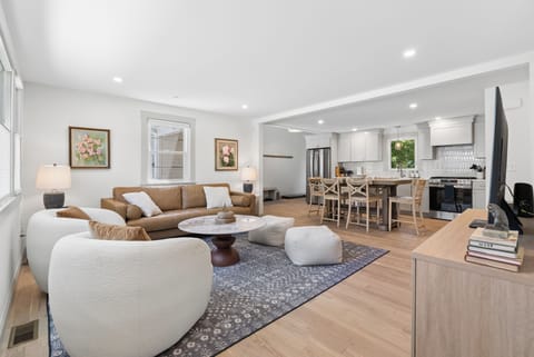 The open floor plan of the kitchen and the living room. 