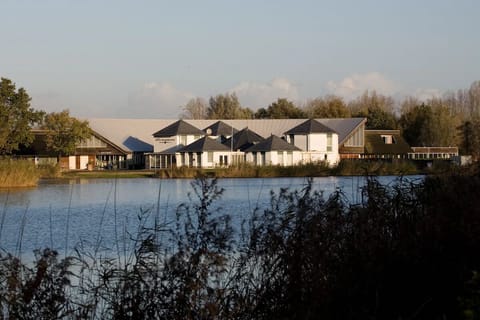 Take in the tranquil property views across the shimmering lake.
