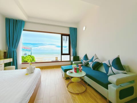 Quadruple Room, Beach View | Desk, free WiFi