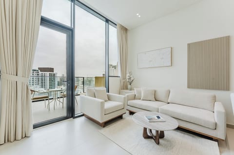 Exclusive Apartment, Balcony, City View | Living area | 40-inch Smart TV with digital channels