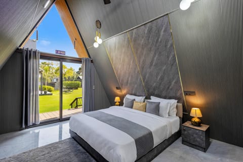 Classic Bungalow, Balcony, Pool View | In-room safe, iron/ironing board, free WiFi