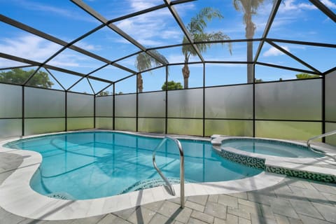 Screened pool with curved layout and entry steps