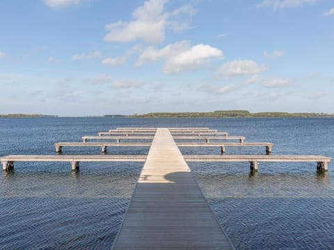 Stroll the long pier and breathe in lake serenity.