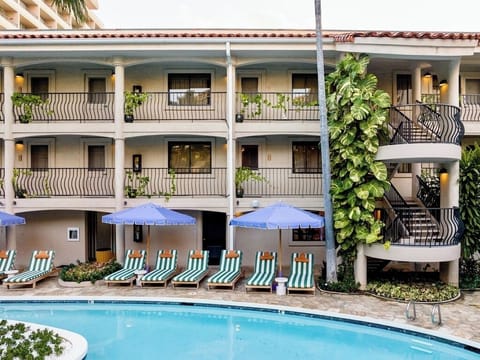 Unwind steps from your room with poolside lounging comfort