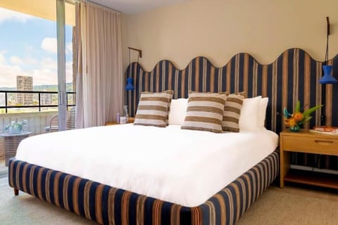 Wake up to sunshine and skyline views from bed.