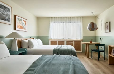 Stretch out in an airy bedroom designed for deep rest.