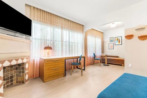 Stretch out by the windows and settle into a cozy lounge.