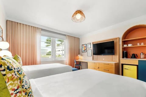 Settle in with smart TV and a cozy room layout.