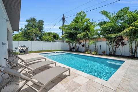 Private, heated saltwater pool with full sun exposure all day