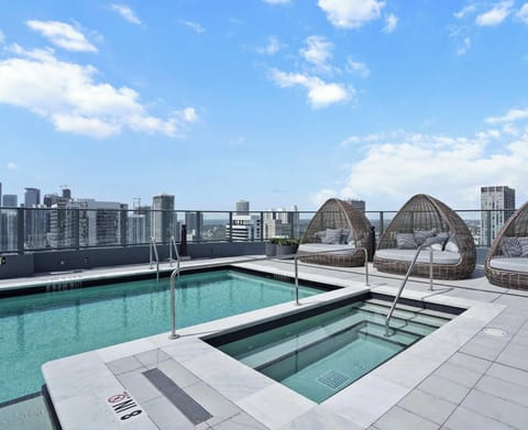 Take in panoramic city views from the pool!