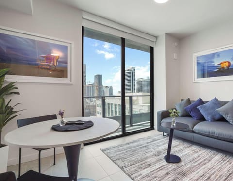 Enjoy breathtaking views of the skyline from your private balcony on the 21st floor.