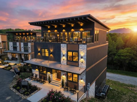 Whispering Pines 6 bedrooms 7 full baths! Features Rooftop Game Room, Theater, Private pool and Hot Tub. Resort with Lazy river, Pickle ball court, Mini golf, Outdoor theater, Infinity pool, Cabanas, Outdoor pool table, Outdoor table tennis and more!