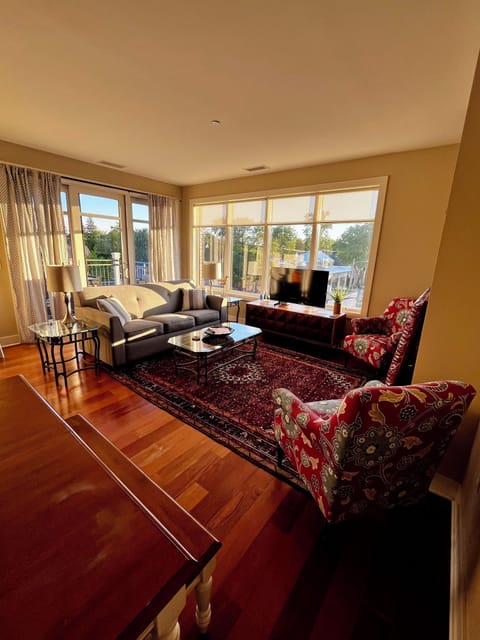 Open, spacious, and light-filled living room.
