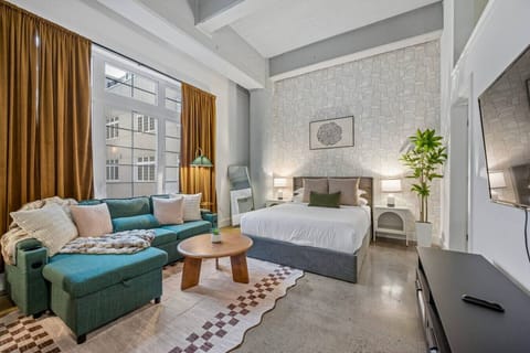 Queen bed in living room