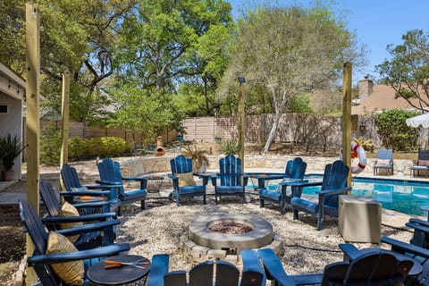 The outdoor space offers the perfect balance of activity and relaxation, from sunny swims to cozy nights by the fire.