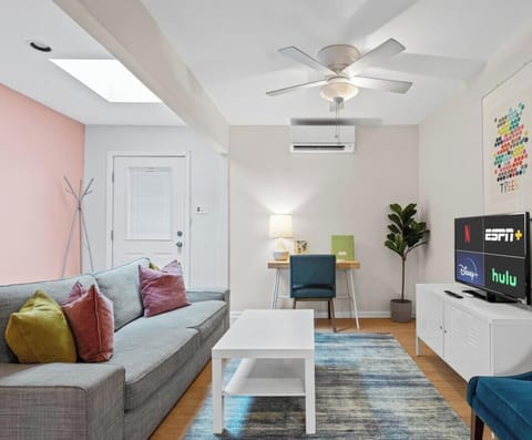 Stream your favorites on the large Smart TV or catch up on work at the dedicated desk nearby.
