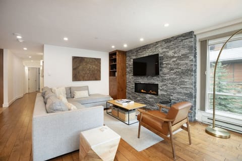 Luxury Living Area with Fireplace & Smart TV
