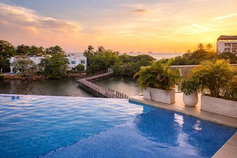 Apartment, 1 Bedroom, Accessible, Lake View | Pool | Outdoor pool