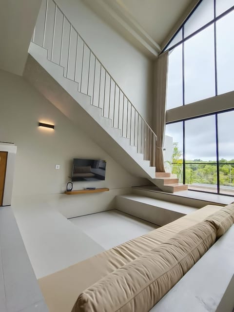 Basic Villa, Courtyard View | Living area | Flat-screen TV