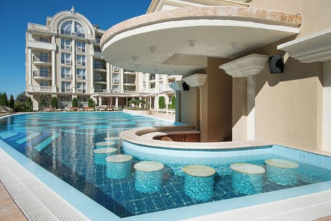 Indoor pool, seasonal outdoor pool, pool umbrellas, sun loungers