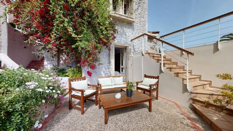 Private Courtyard with Outdoor Dining and Stone Staircase