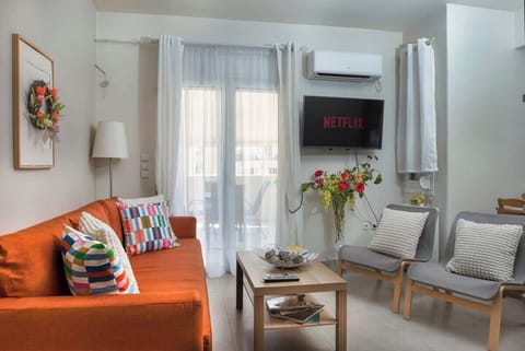 Bright and welcoming living room with cozy seating and warm tones.