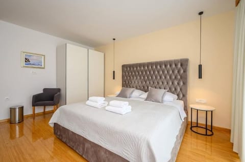 Deluxe Double Room, Balcony | In-room safe, desk, laptop workspace, blackout drapes
