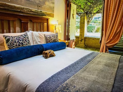 Luxury Double Room, Patio, Garden View | In-room safe, iron/ironing board, WiFi (free)