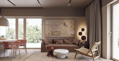 A wide-angle shot captures the harmony between the soft gray sofa and the dining area set for a meal.