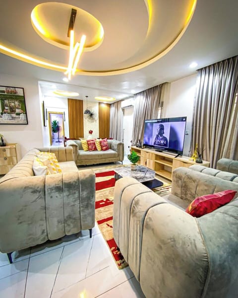 Family Apartment, Balcony, City View | Living area | Flat-screen TV