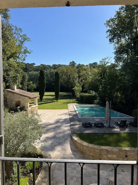 Deluxe Quadruple Room | Pool | Seasonal outdoor pool, open 8:00 AM to 8:00 PM, pool umbrellas