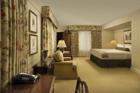 Settle into a roomy suite-style bedroom with classic charm.