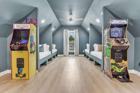 Bonus room designed for groups with four built in beds and two classic arcade games.