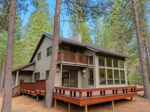 Exterior back of house with large deck to enjoy summer evenings.