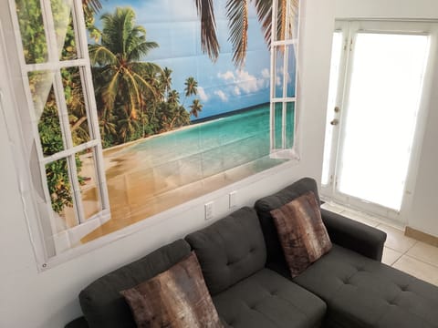 Condo, Balcony, Garden View | Living area | 32-inch LCD TV with satellite channels