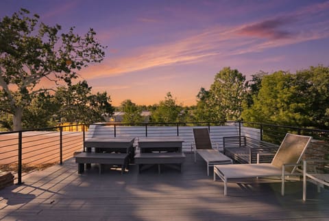 Private rooftop deck at sunset — skyline views over Washington, DC