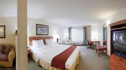 Desk, laptop workspace, blackout drapes, iron/ironing board