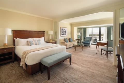 Stretch out in this spacious suite with comfortable lounge seating.