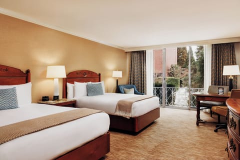 Relax in crisp linens, surrounded by soft, warm bedside lighting.
