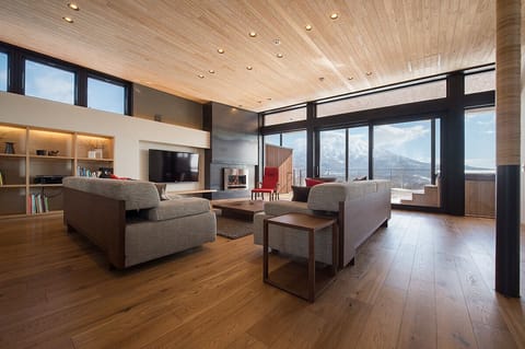 Luxury Chalet, Balcony, Mountain View | Living area | Flat-screen TV, fireplace, DVD player