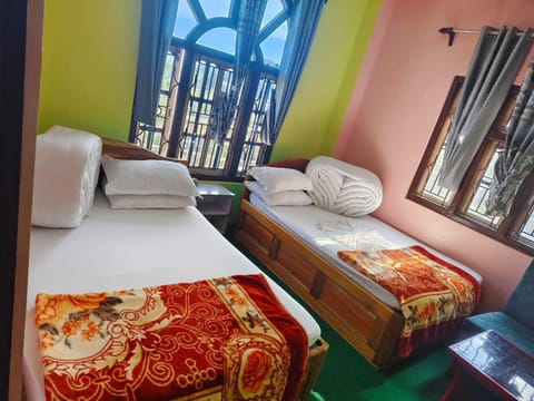 Deluxe Quadruple Room, Balcony | Desk, free WiFi