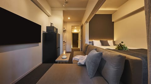Double Room | Living area | Flat-screen TV
