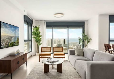 Front-row perch to panoramic cityscape, twin lounge chairs, breezy atmosphere, memorable evening conversations await here