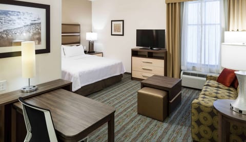 Desk, laptop workspace, blackout drapes, free cribs/infant beds